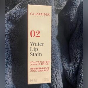 Clarins Water Lip Stain in 02 Orange Water. NIB